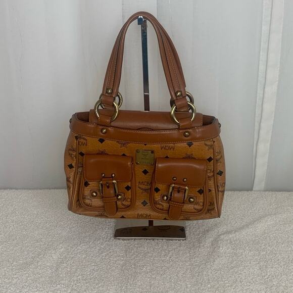 MCM Handbags - GUC MCM SMALL COGNAC VISETOS BOSTON BAG, L 10” x H 6.5” x D 3.5”